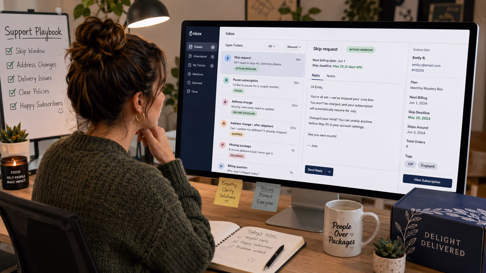 Subscription box customer support representative reviewing skip and pause requests on computer