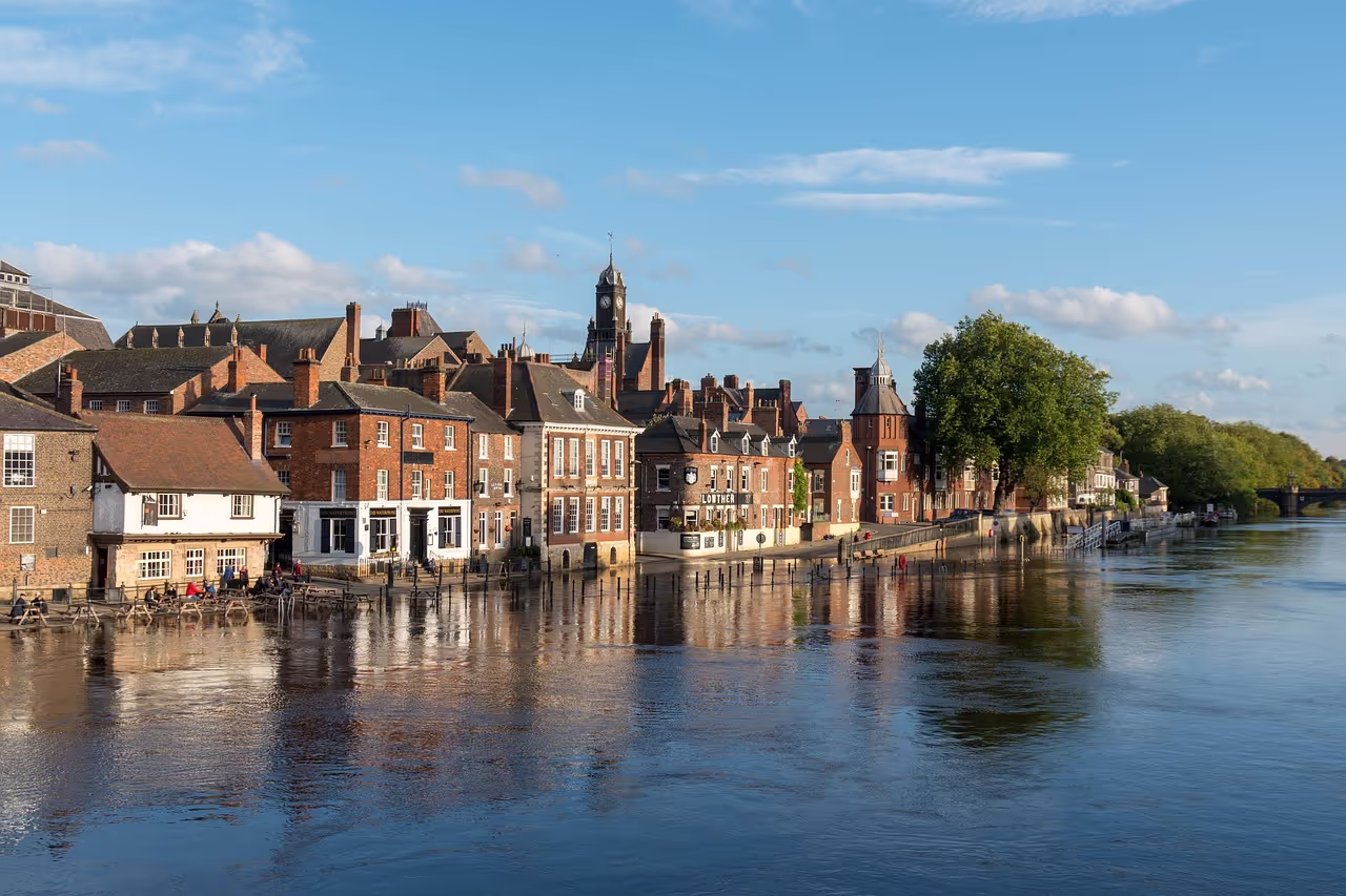 A diverse team collaborating on business growth strategies, symbolizing JGL Associates' journey and values.