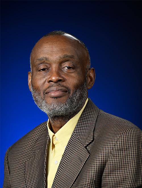 Man posing in white tshirt