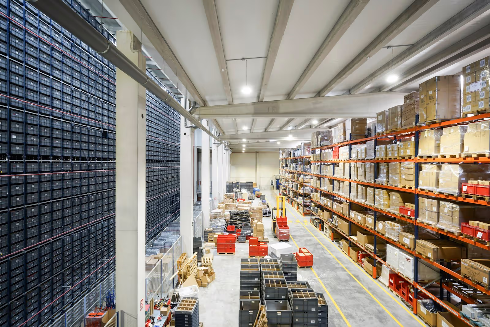 A retailer looking at complex data and struggling with supply chain issues, symbolizing operational challenges.
