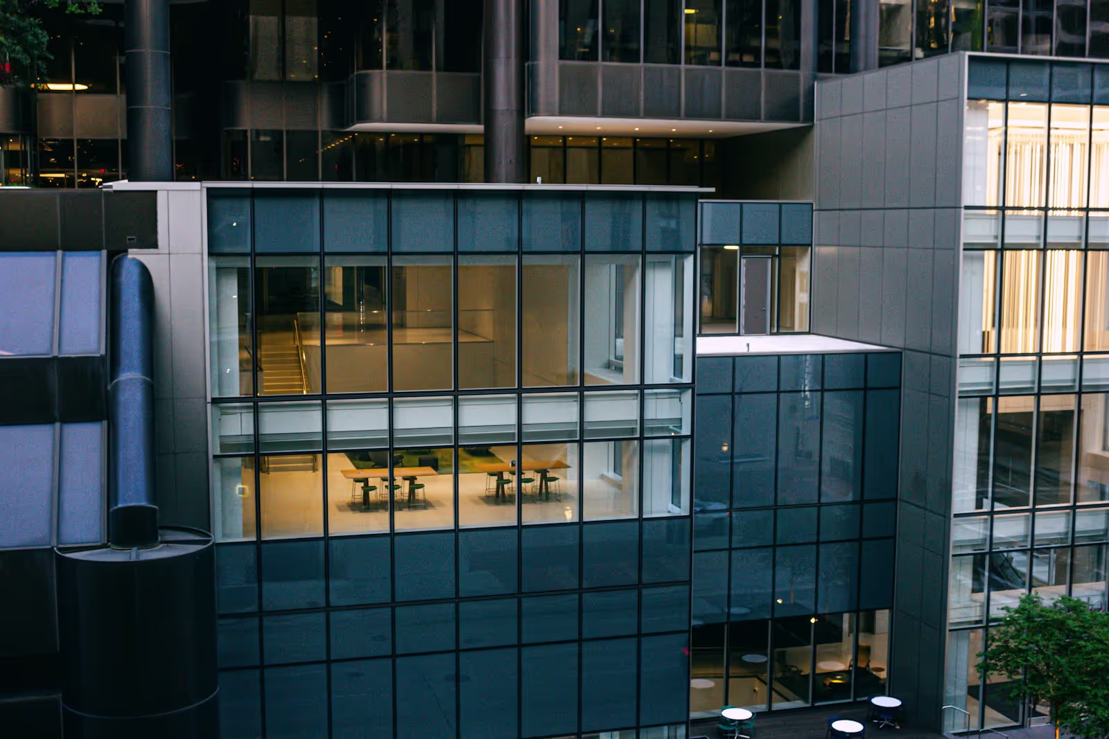 A professional notary public in a modern Houston office setting, preparing documents for signing.