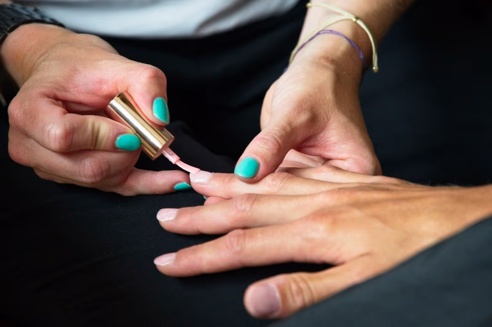 Close-up of a woman receiving a professional manicure