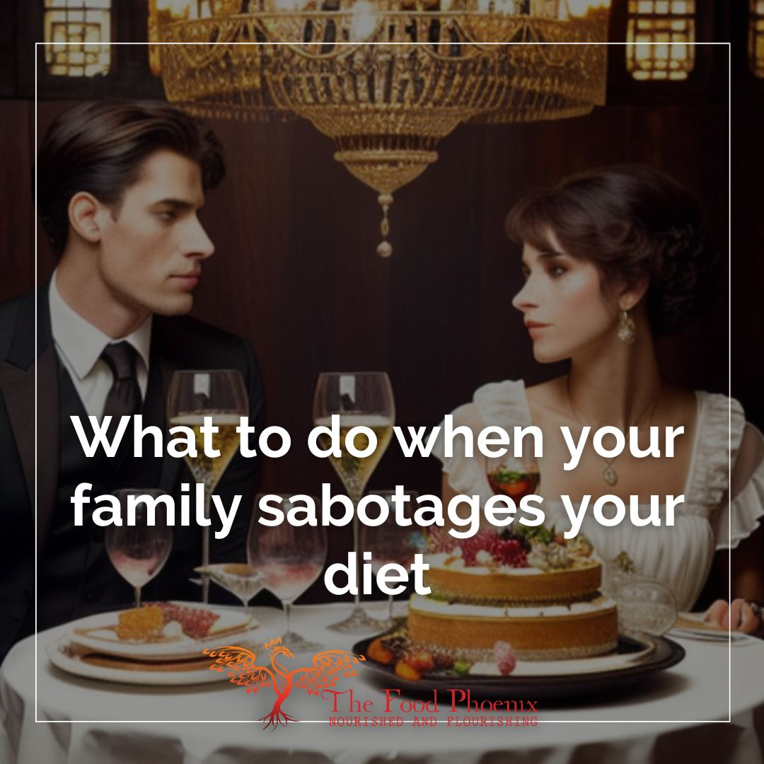 Elegant dinner scene with a man in a tuxedo and a woman in a white dress seated at a table with wine glasses and a layered cake under a chandelier; overlaid text reads 'What to do when your family sabotages your diet,' with The Food Phoenix logo at the bottom.