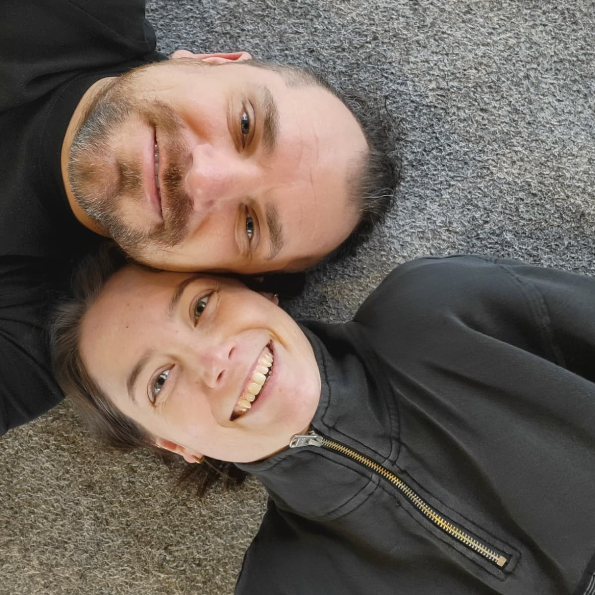 Konrad and Caro laying on the floor