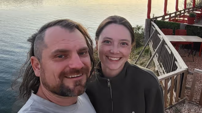 Konrad and Caro by a lake in France