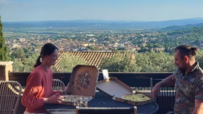 Konrad and Caro having a pizza at one of our house sits in France