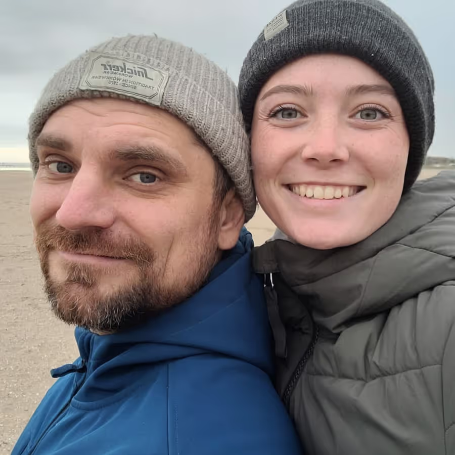 Konrad and Caro on a beach in Belgium