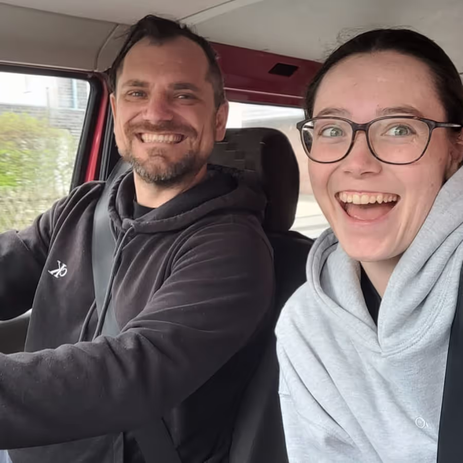 Konrad and Caro in the van
