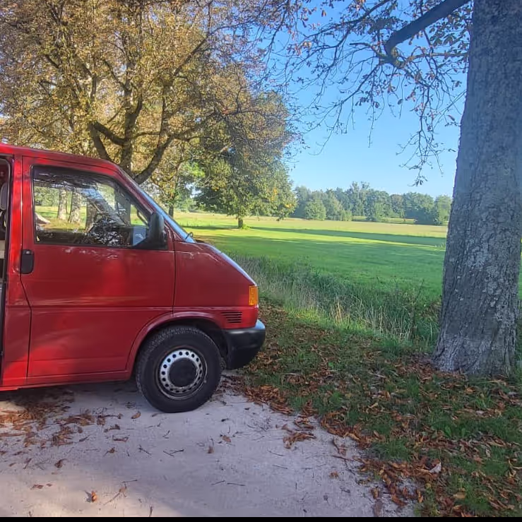 Campervan parked in a Park in Germany Campervan parked in a Park in Germany