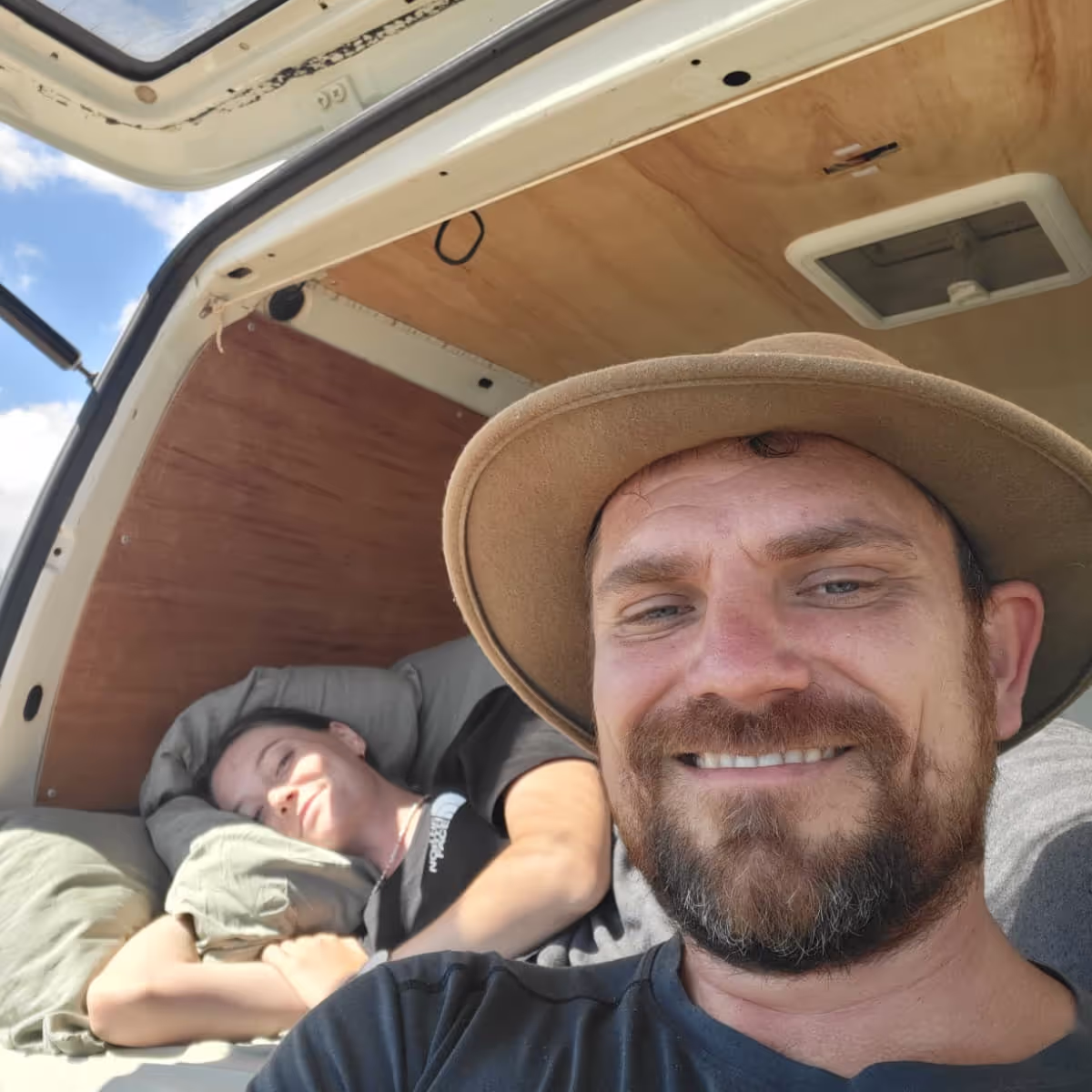 Konrad and Caro at the back of their Camperban in Australia