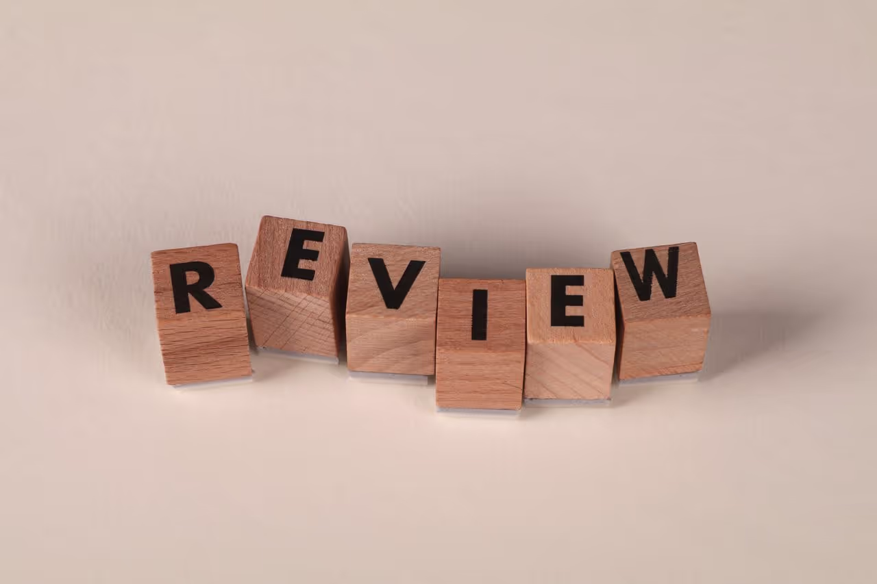 A set of blocks spelling out the word Review