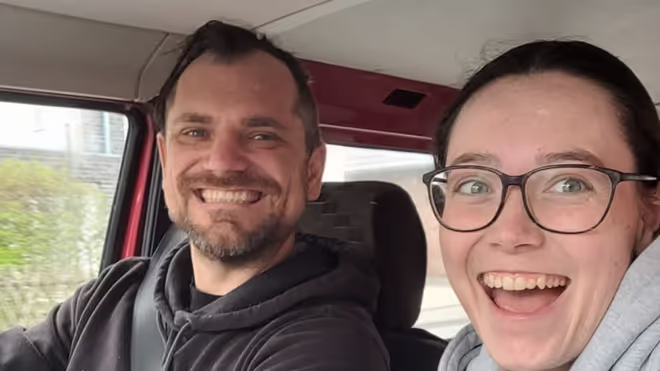 Konrad and Caro in their van Konrad and Caro in their van