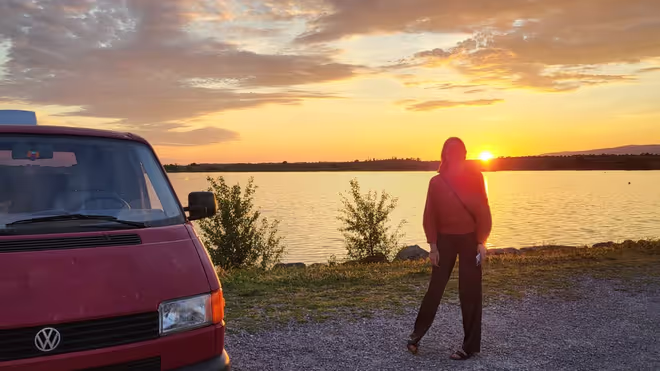 Caro by a lake and our VW T4 in France Caro by a lake and our VW T4 in France