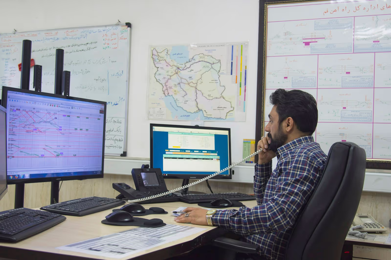 Professional dispatch team working on logistics planning