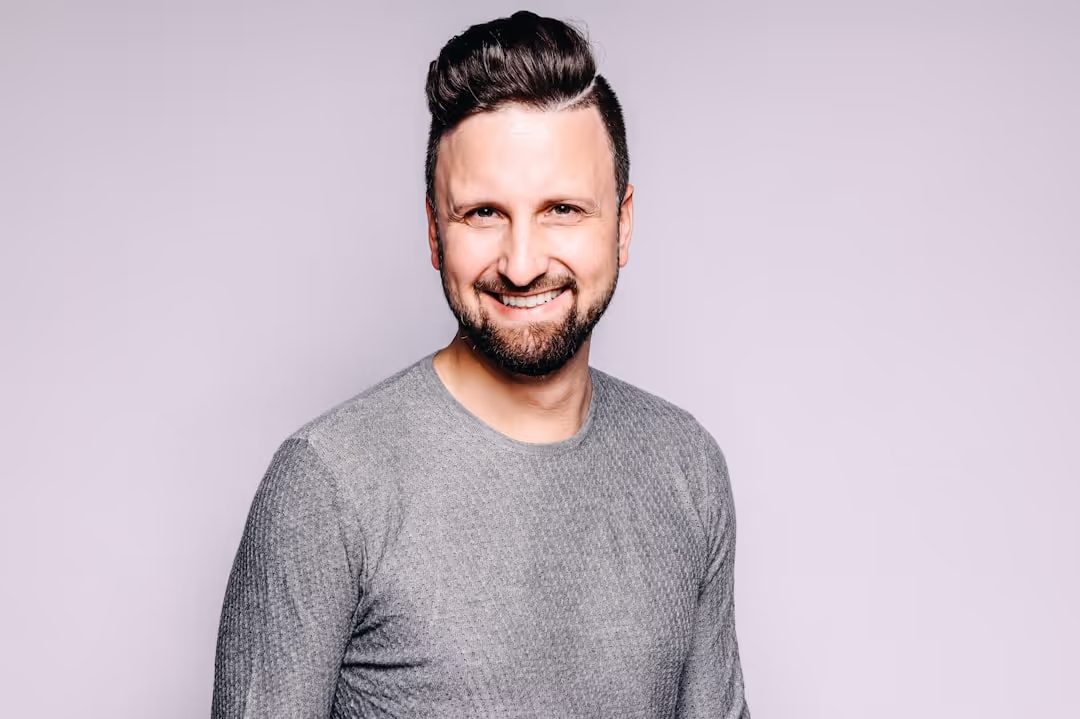 Profile picture of a smiling man