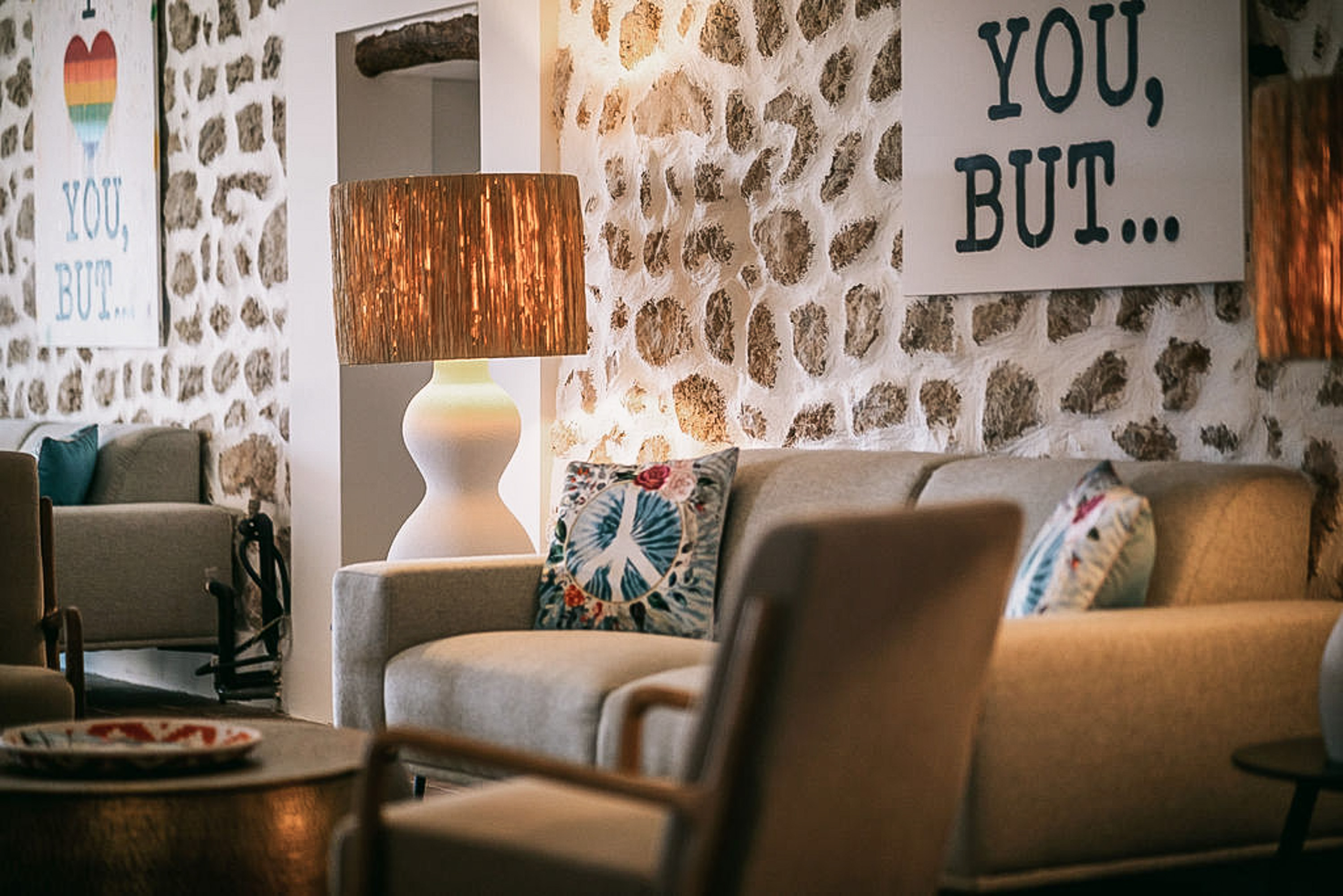 Minimalist hotel interior with natural materials and soft, warm light.