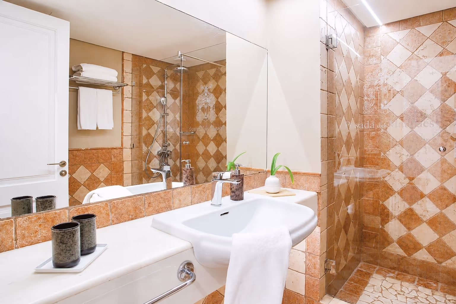 Modern spa-inspired bathroom with sleek fixtures and premium toiletries