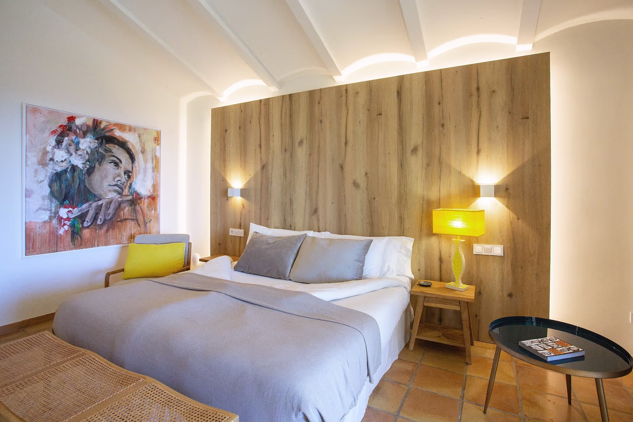 A close-up view of the king-size bed in the Junior Suite, highlighting the luxurious bedding and elegant headboard.