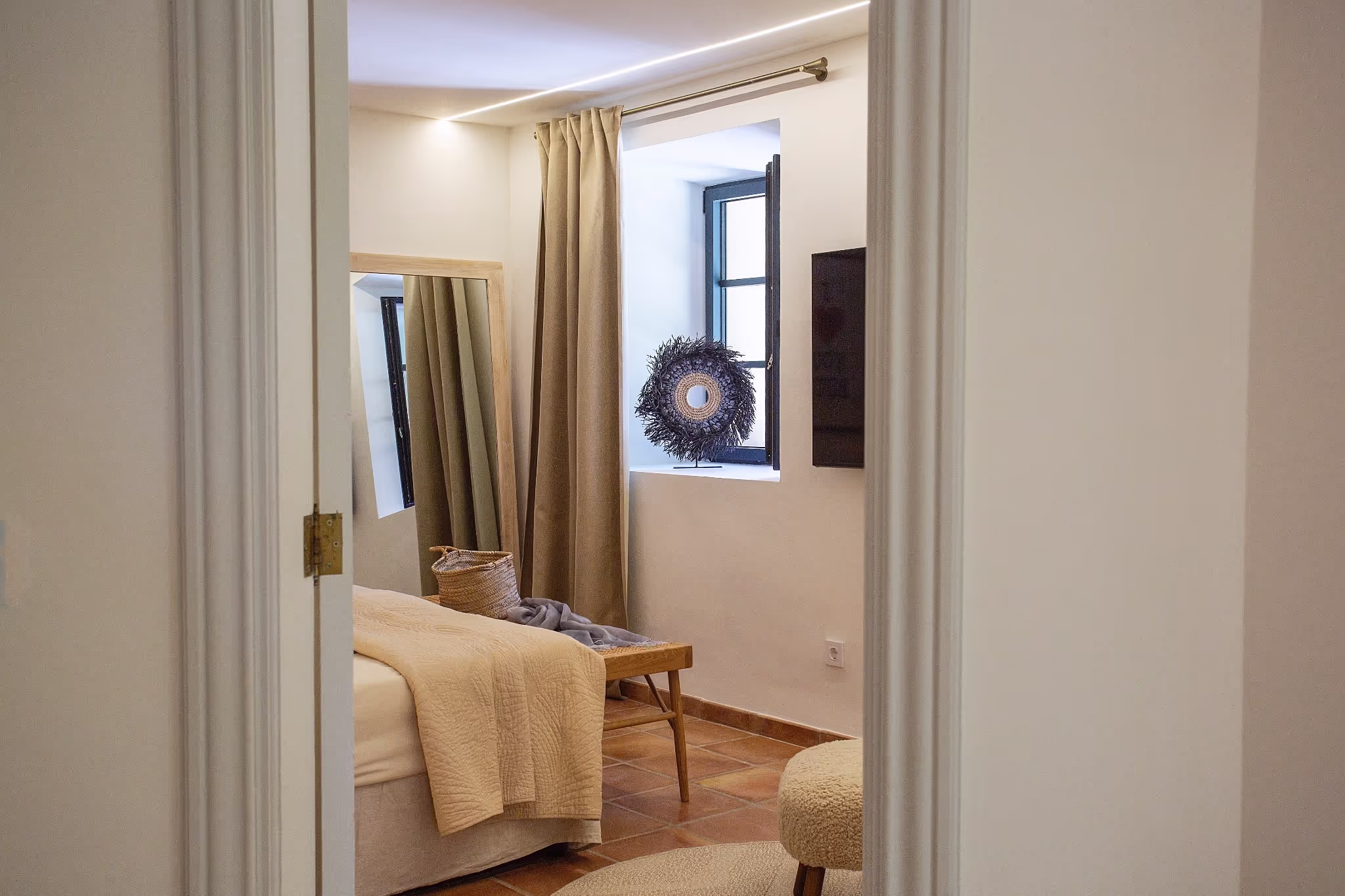 A close-up view of the king-size bed in the Junior Suite, highlighting the luxurious bedding and elegant headboard.