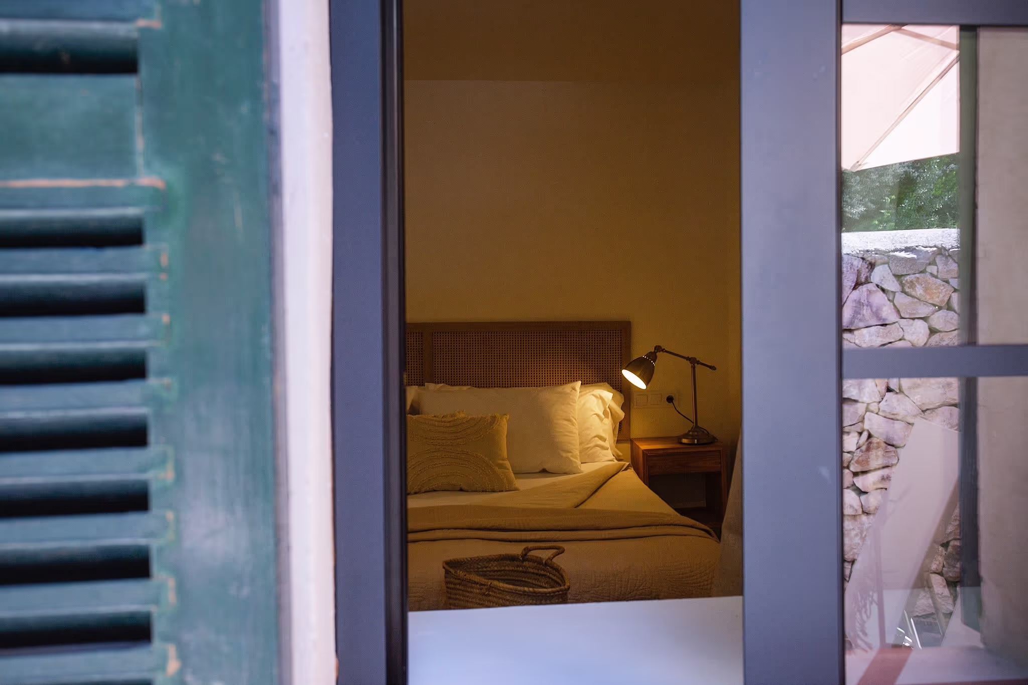 A cozy sitting area within the Junior Suite, featuring comfortable armchairs and a small table.
