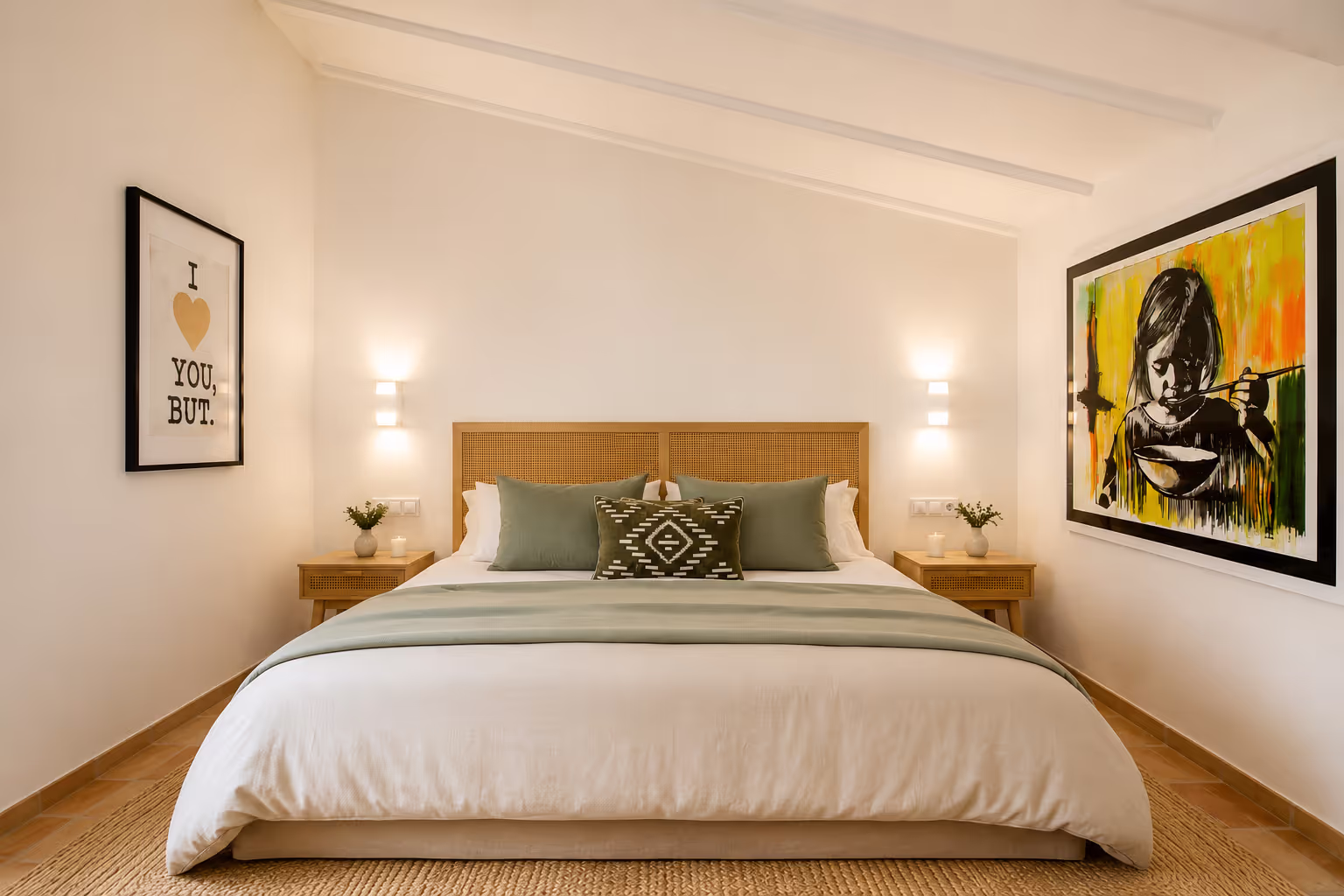 Elegant Deluxe Double Room with a large king-size bed and modern decor