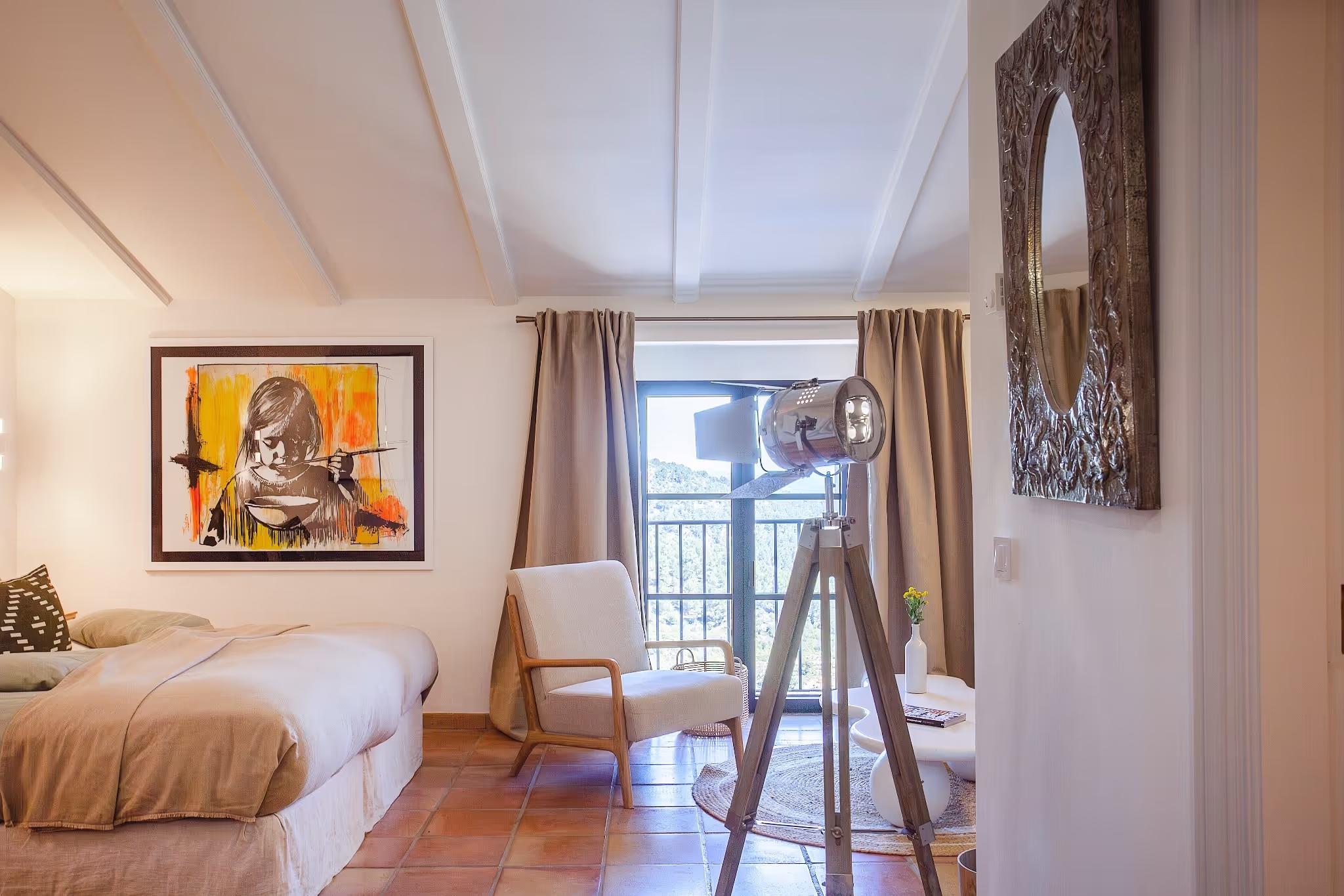 Elegant Deluxe Double Room with a large king-size bed and modern decor