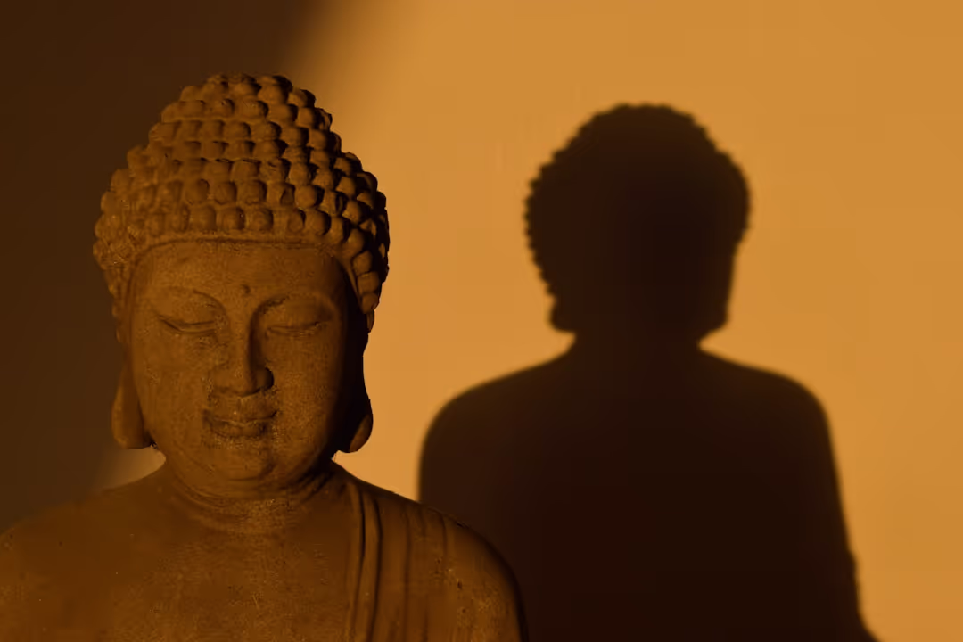 A musician's silhouette playing during a calm, meditative sunrise, evoking Raga Bhairav.