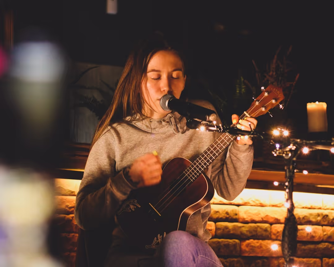 Student performing classical guitar